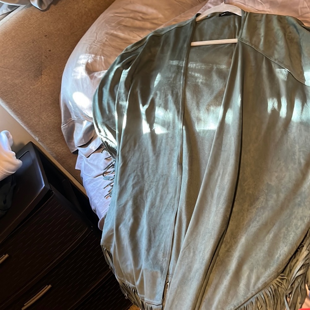 A navy green shaw with soft material